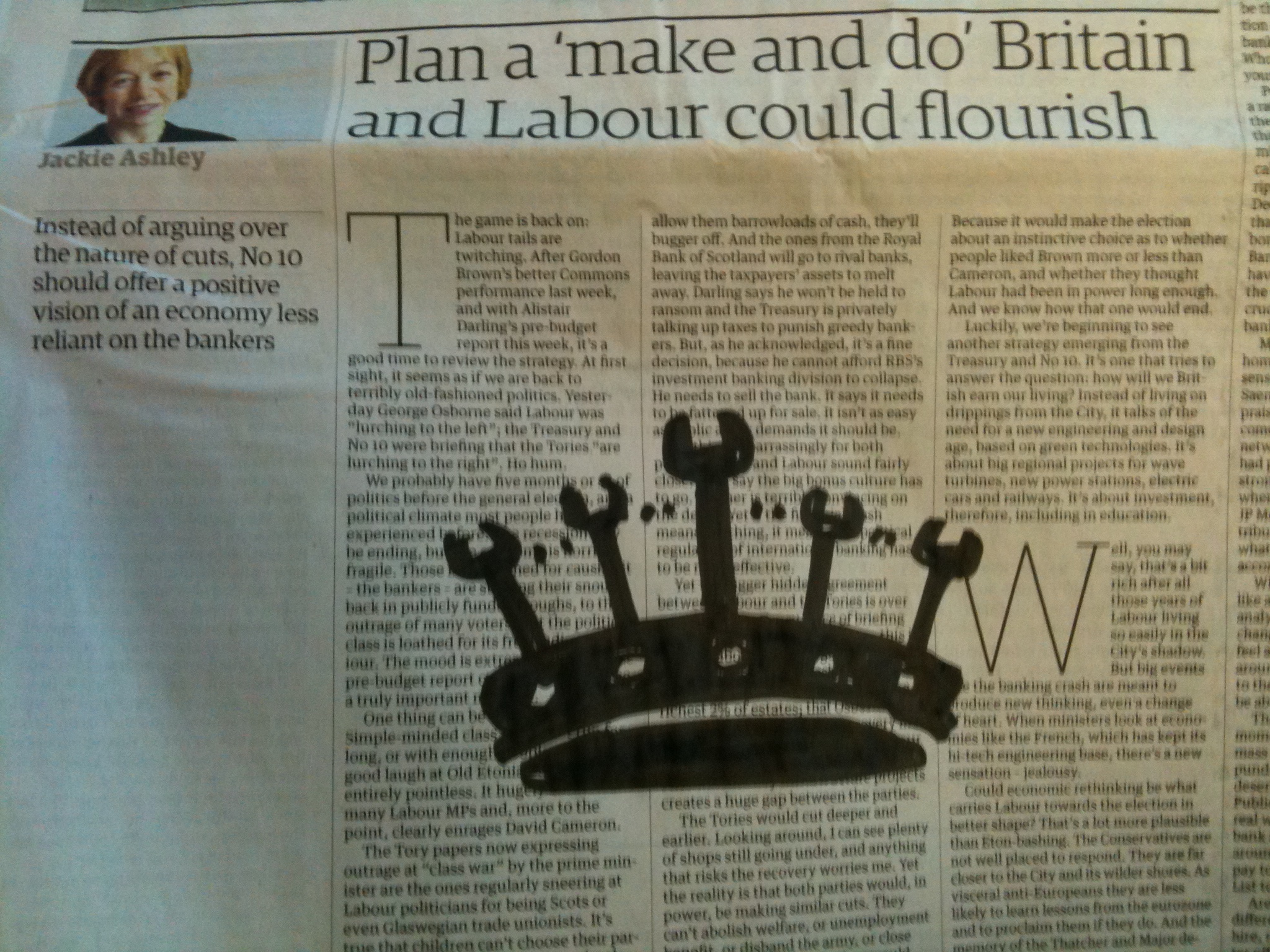 A spanner crown drawn in black marker straight onto a Guardian G2 page, over Jackie Ashley's column 'Plan a make and do Britain and Labour could flourish'